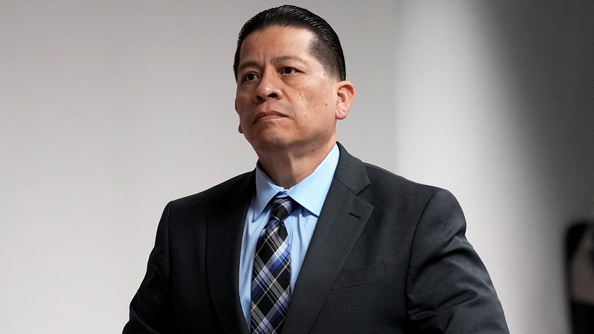 Former Uvalde school district police officer Adrian Gonzales in courtroom during trial