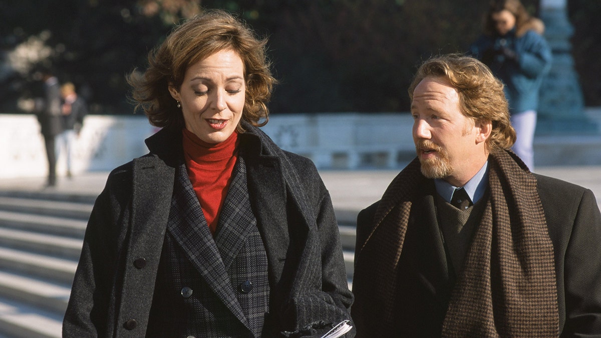 Allison Janney and Timothy Busfield on the set of "The West Wing."