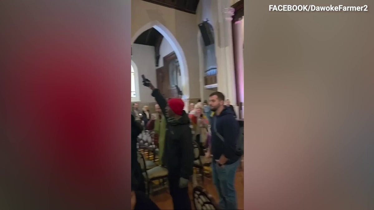 Anti-ICE protesters inside a church