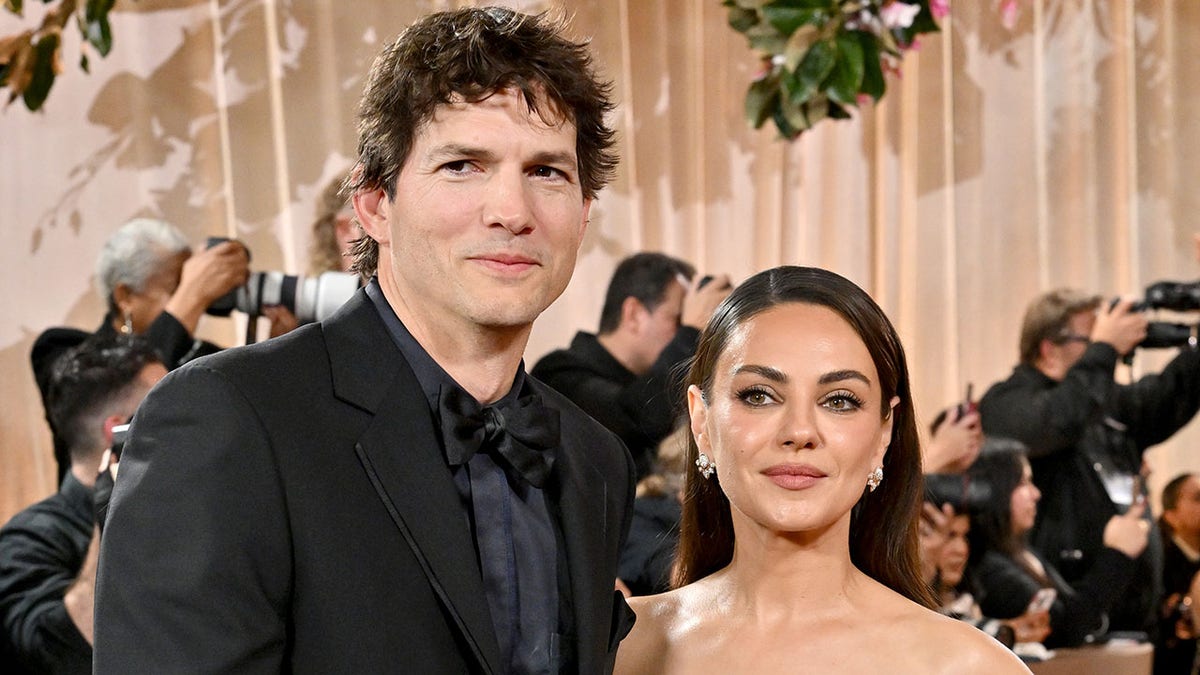 Ashton Kutcher and Mila Kunis on red carpet