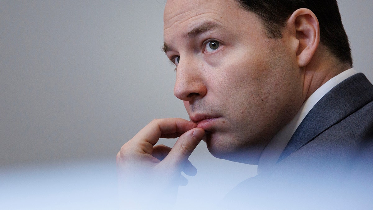 Brendan Banfield listens to testimony during his double murder trial in Virginia