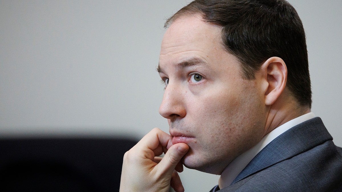 Brendan Banfield listens to testimony during his double murder trial in Virginia