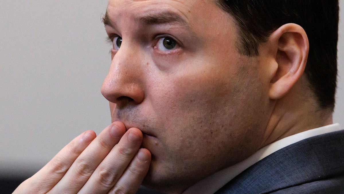 Brendan Banfield listens to testimony during his double murder trial in Virginia