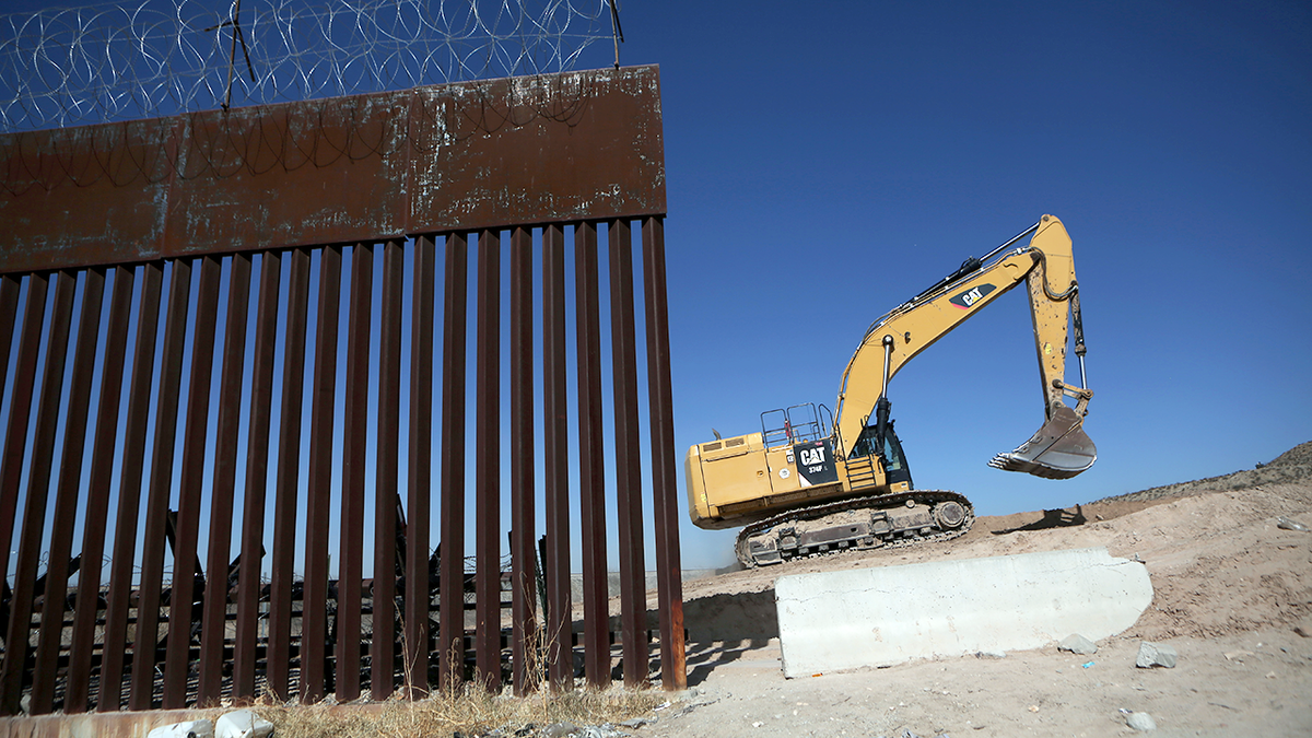 Construction continues on a border wall