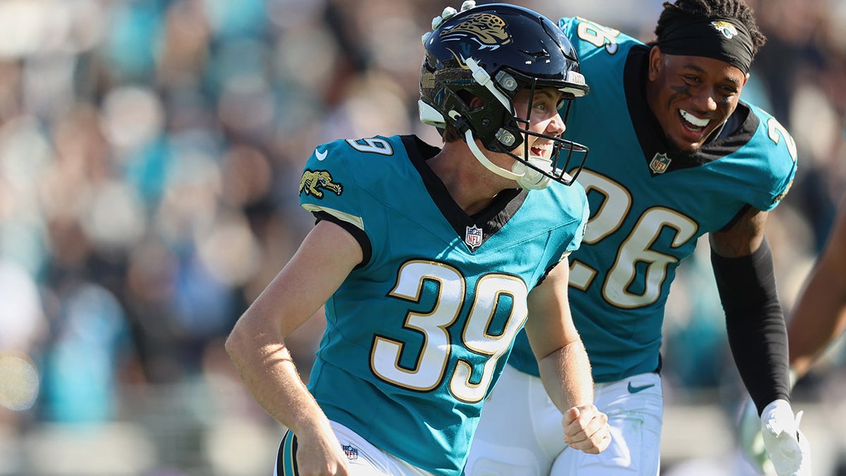 Cam Little celebrating