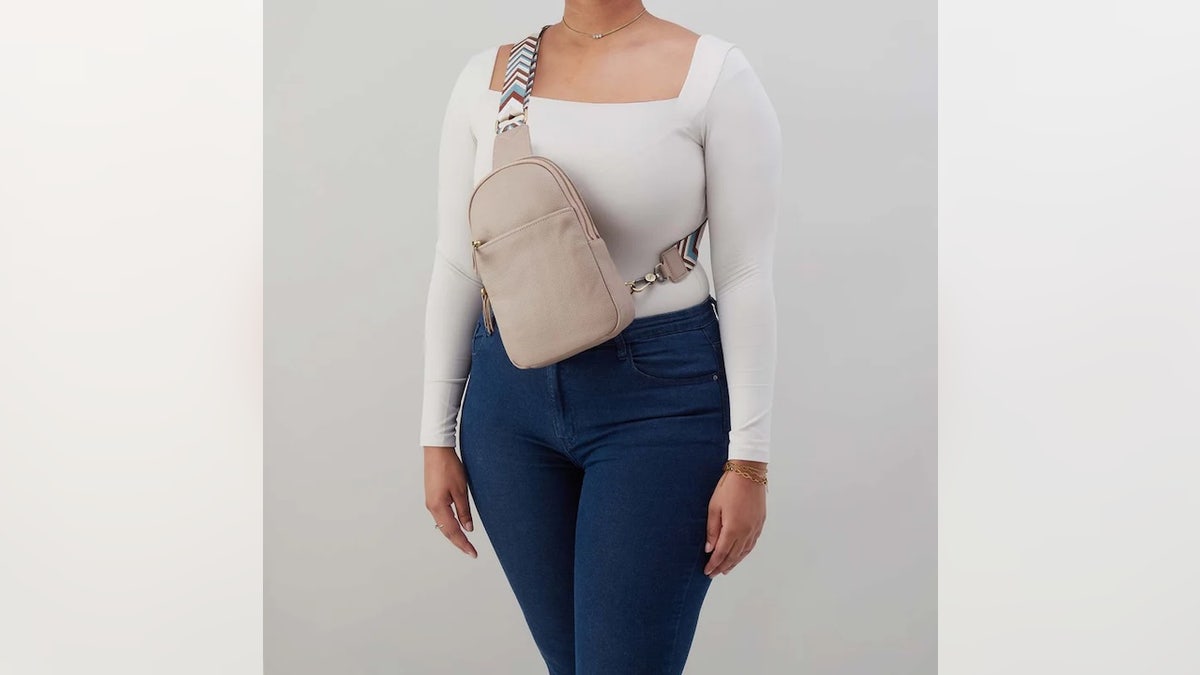 Neutral colors pair with bright, colorful straps to create a spacious and fun bag.