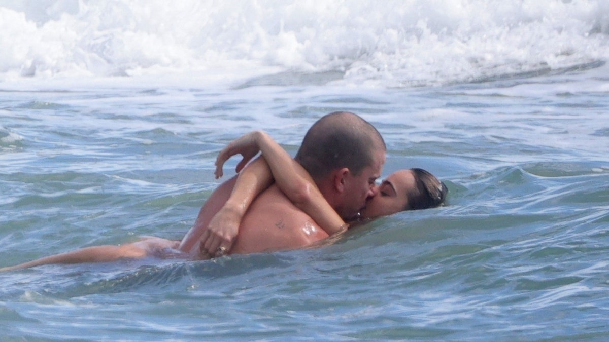Tatum and Williams shared a kiss while swimming in the ocean.