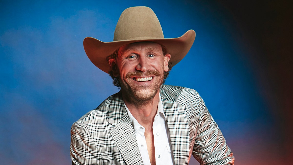 Chase Rice poses for a portrait in the studio at the 2024 People’s Choice Country Awards.