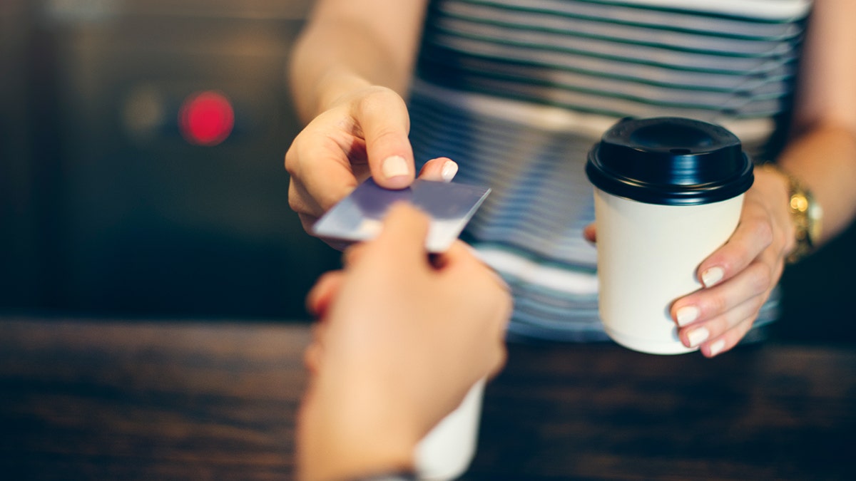 Customer buying coffee