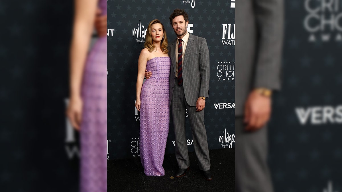 Leighton Meester and Adam Brody attend Critics Choice Awards.