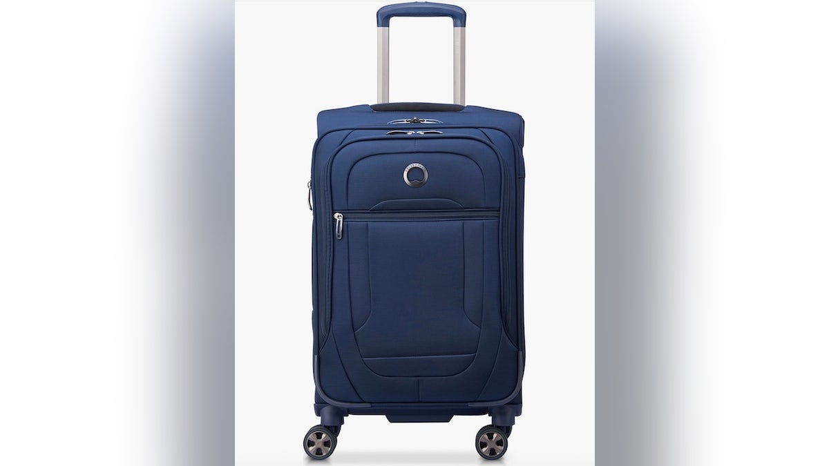 A soft-sided carry-on fits better into tight overhead bin spaces.