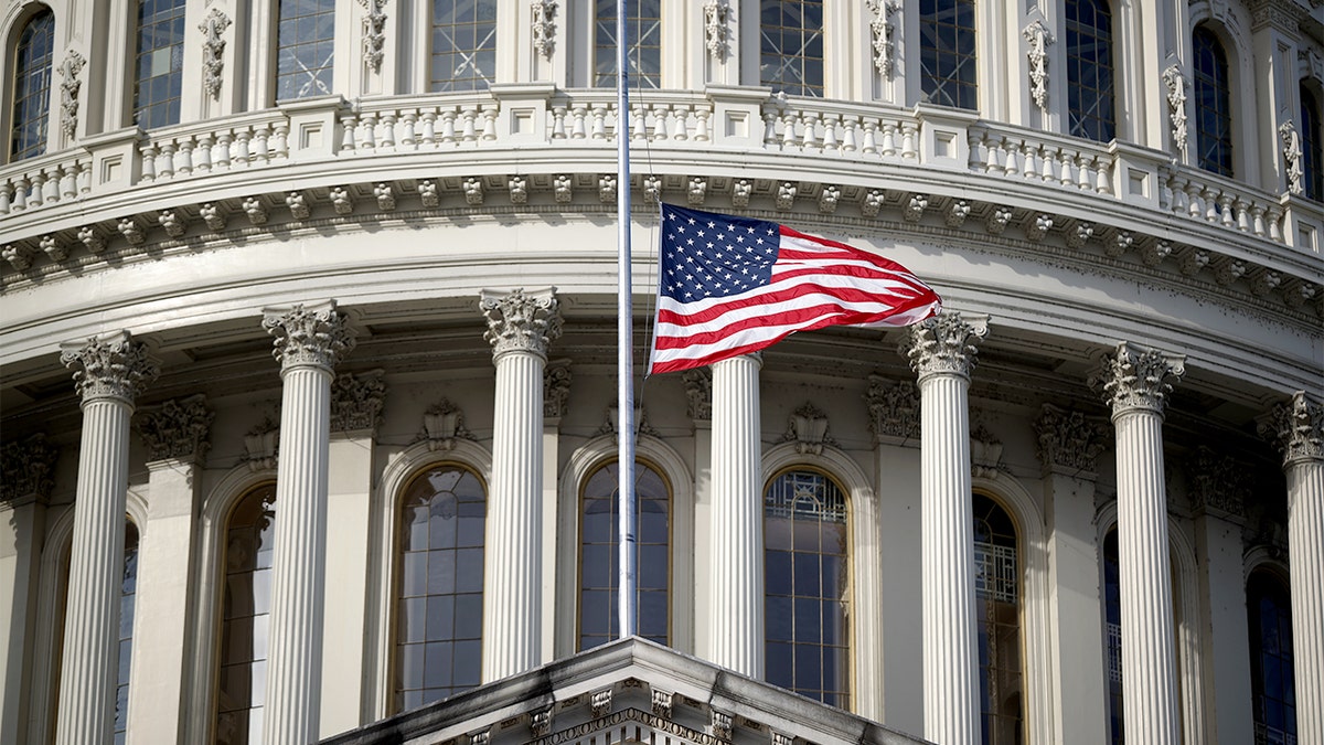 Capitol dome stands against an early sky following a late-night congressional agreement.