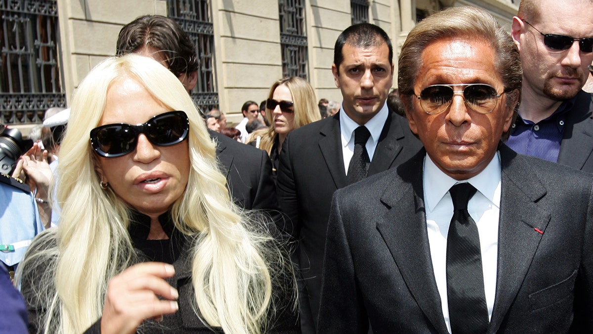Designer Valentino Garavani and Donatella Versace pictured attending the funeral of Italian fashion designer Gianfranco Ferré at St. Magno Church in Legnano, Italy, on June 19, 2007.