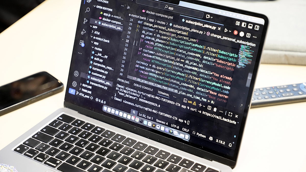 Laptop unfastened to codification connected the screen.