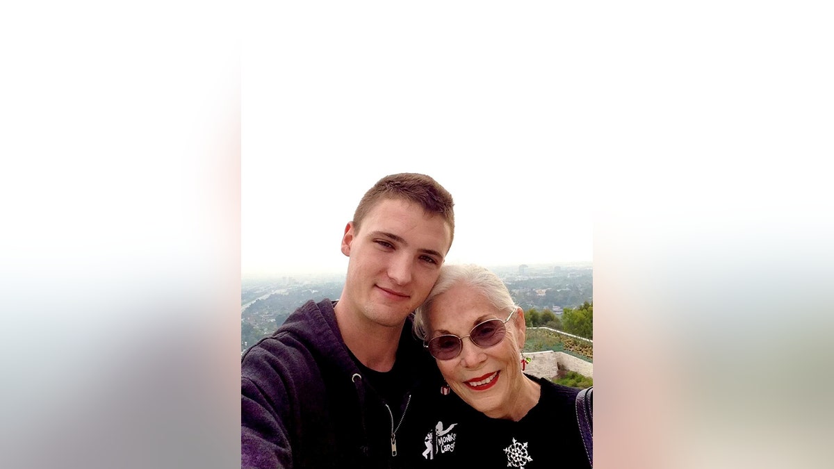 Hudson Madsen embracing his grandmother.