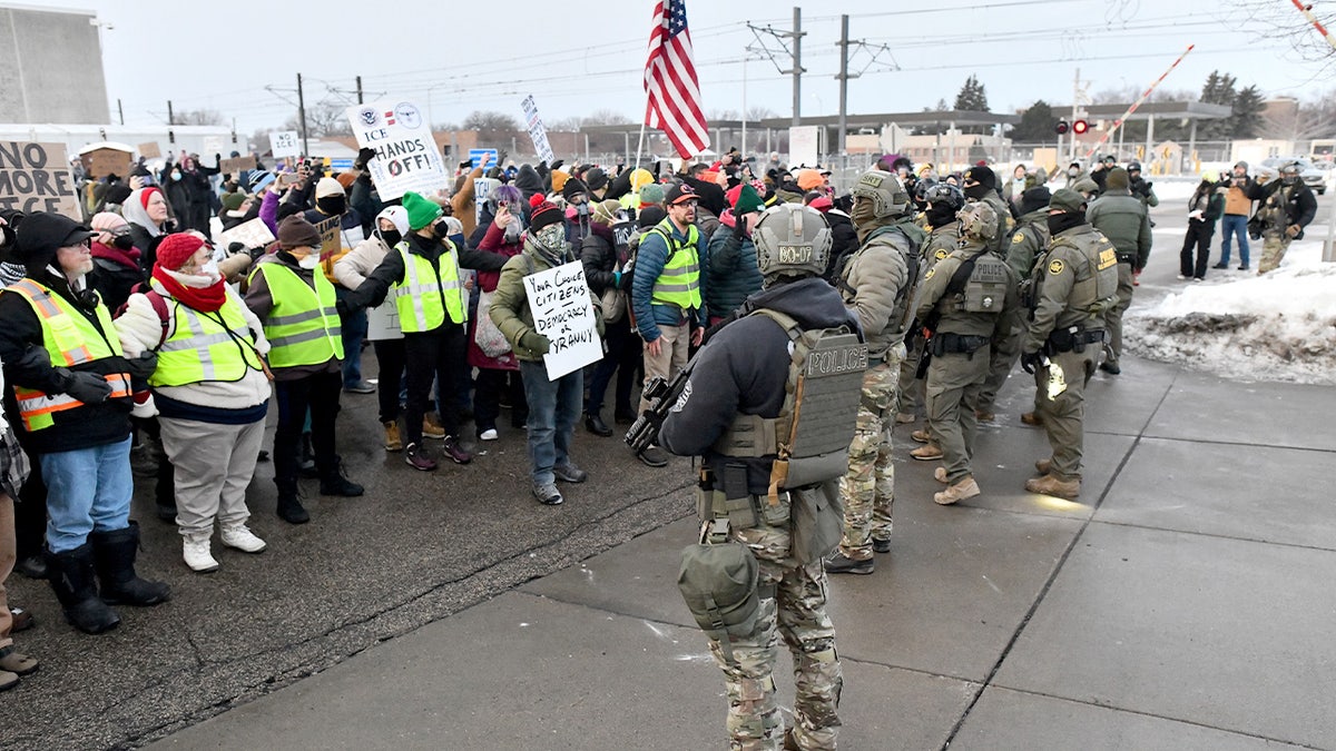 ICE officers and protesters in Minneapolis