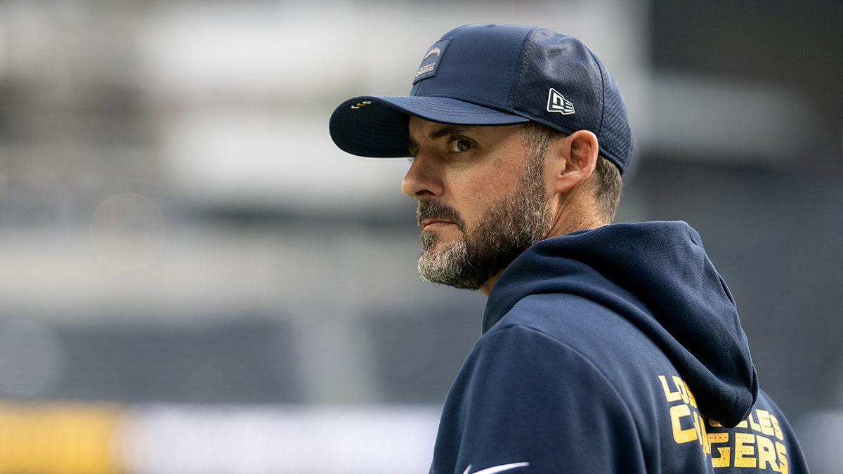 Jesse Minter looks on