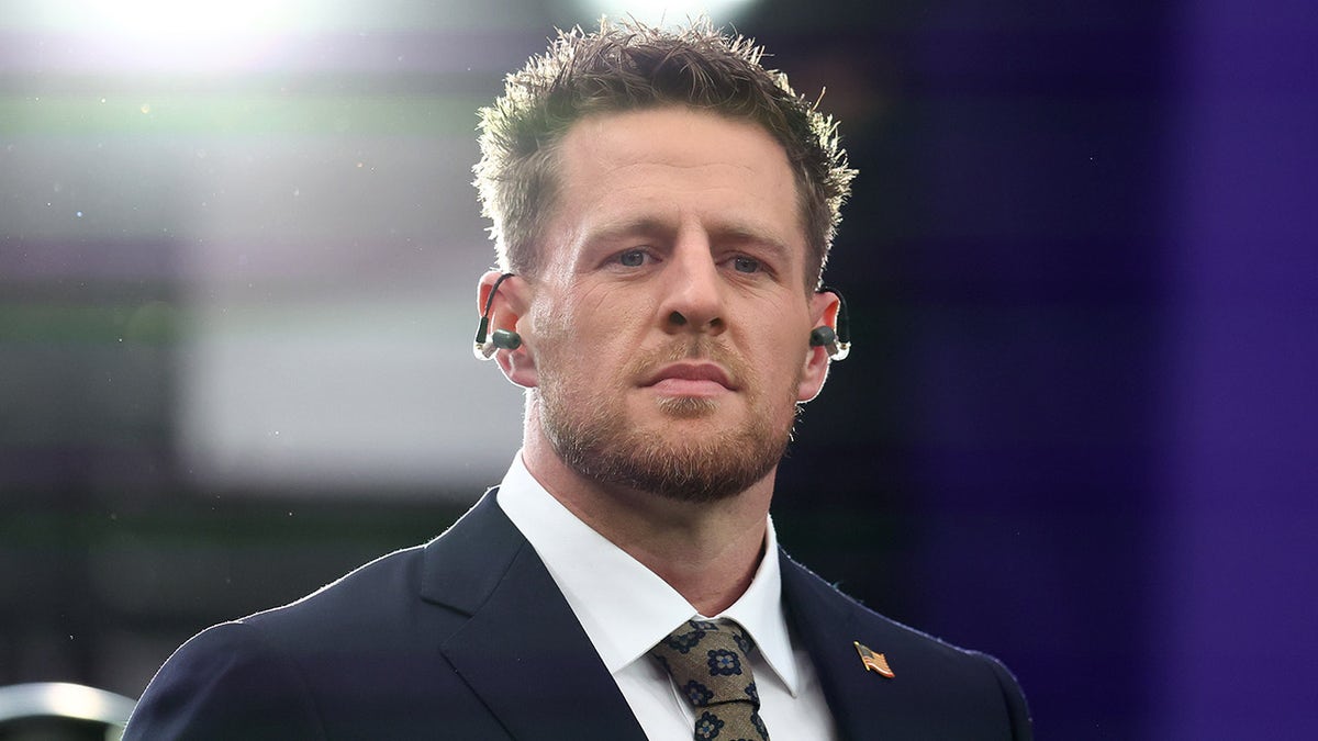 J.J. Watt looks on