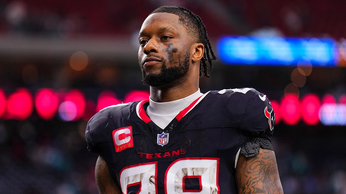 Joe Mixon looks on during a game