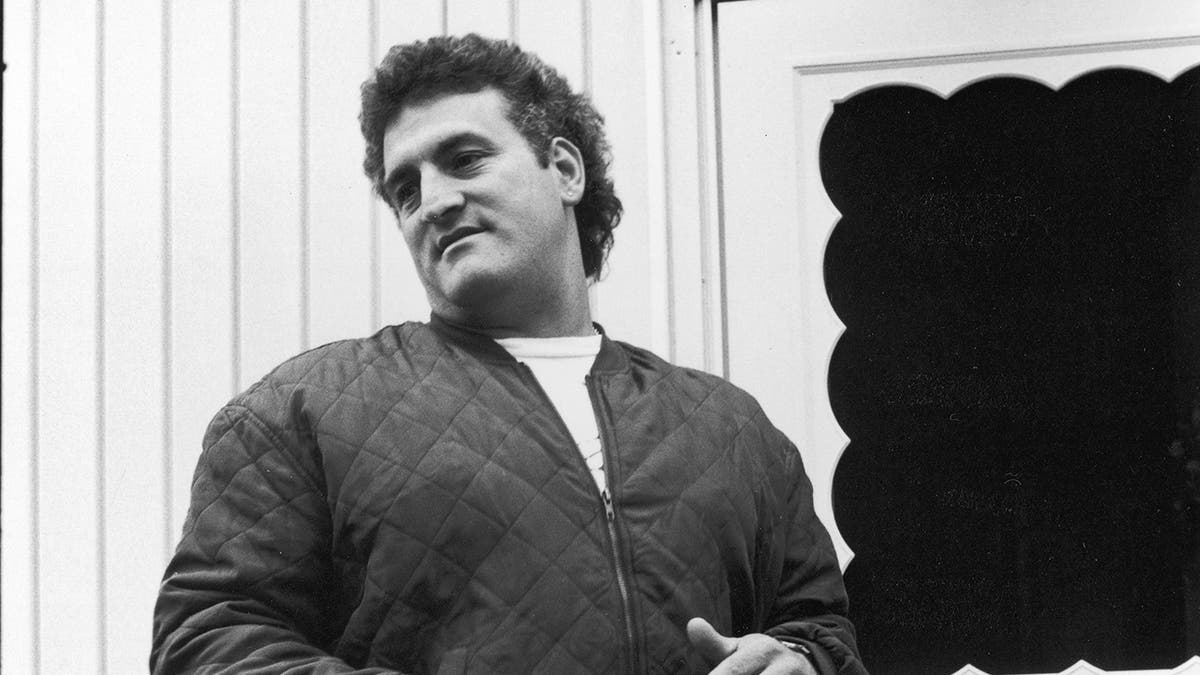 Joey Buttafuoco turning away in a jacket.