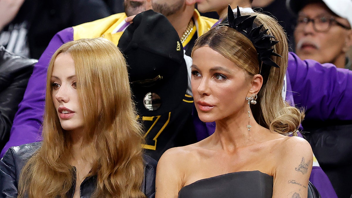 Kate Beckinsale and Lily Mo Sheen sit courtside while attending a Los Angeles Clippers vs. Los Angeles Lakers basketball game at Intuit Dome.