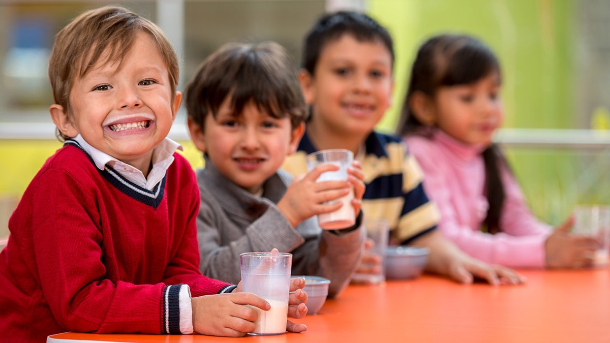 Kids drinking milk