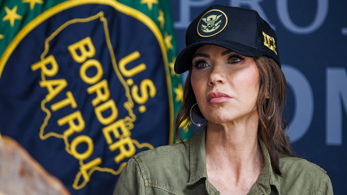 Kristi Noem with U.S. Border Patrol logo in background