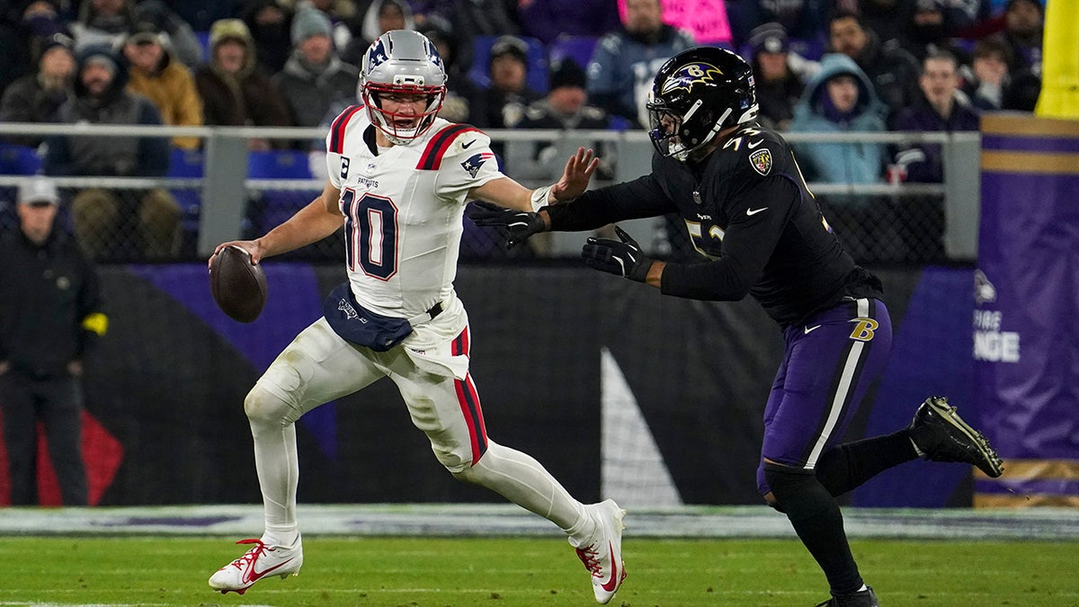 Kyle Van Noy pursues Drake Maye