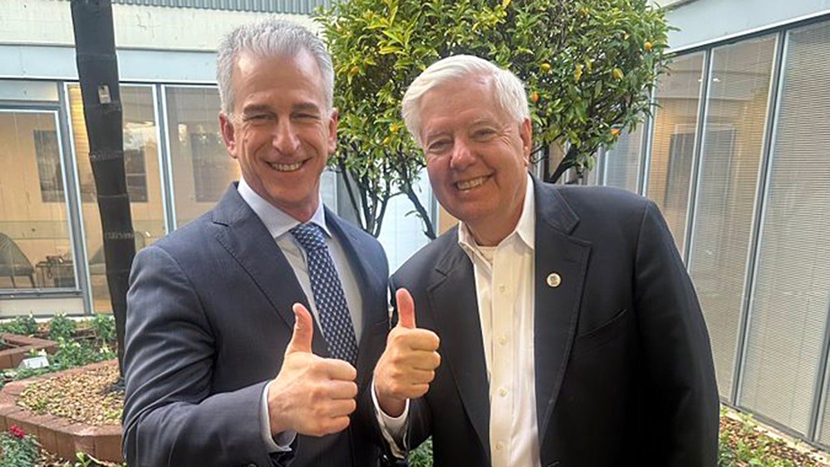 U.S. Sen. Lindsey Graham and Israeli Mossad Director David Barnea give a thumbs up