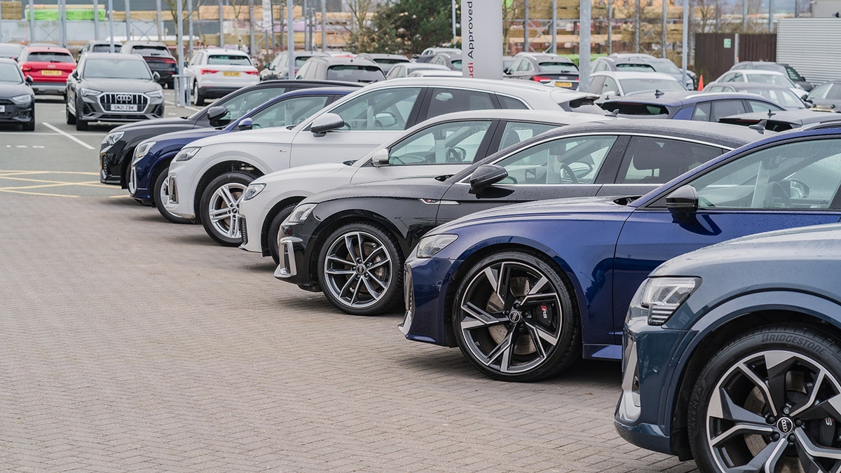 Luxury vehicles successful a dealership lot