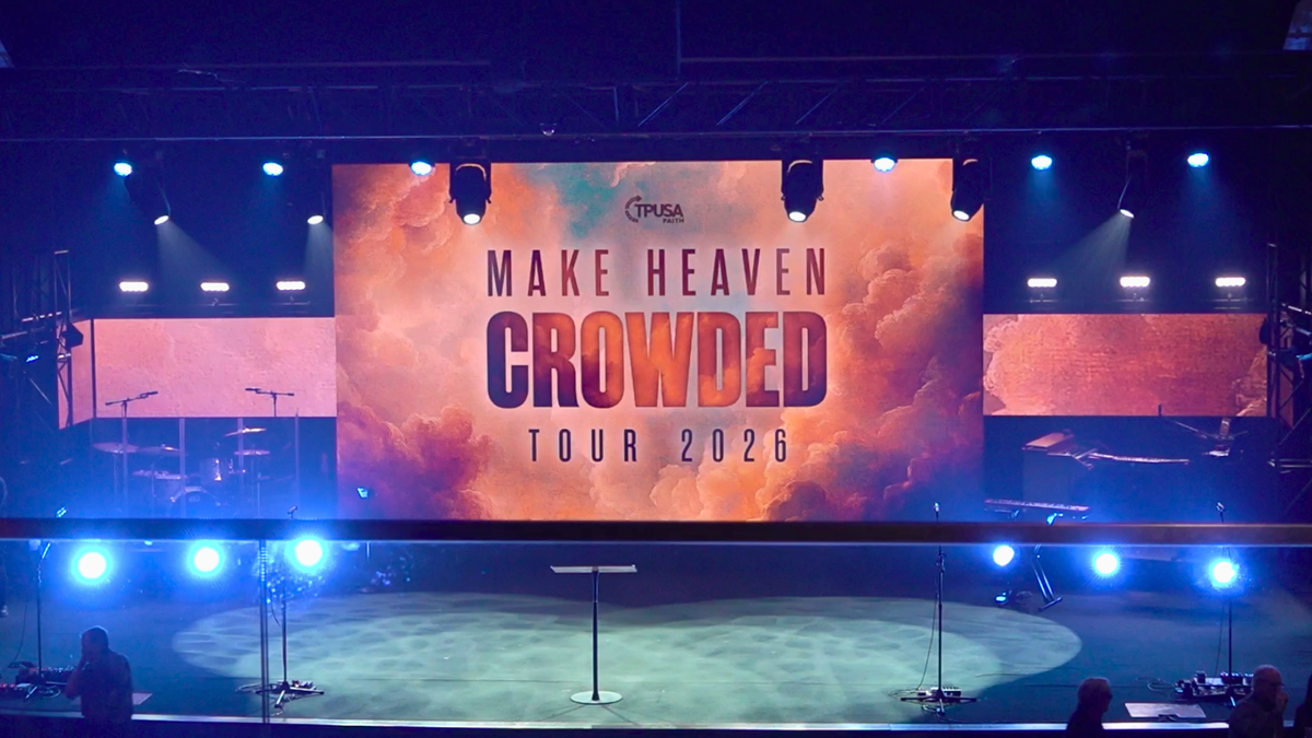 Sign on stage that says "Make Heaven Crowded Tour 2026"