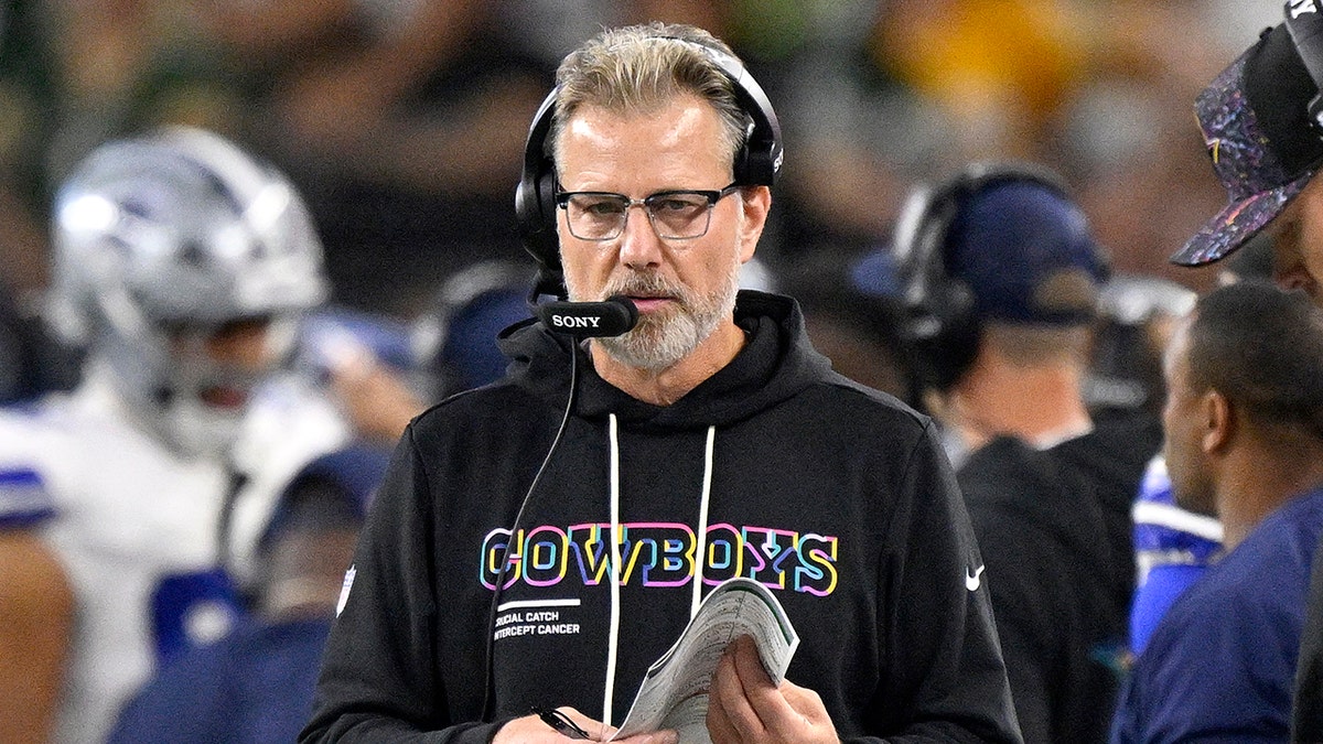 Matt Eberflus looks on