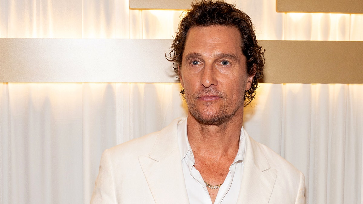 Matthew McConaughey wears a white shirt