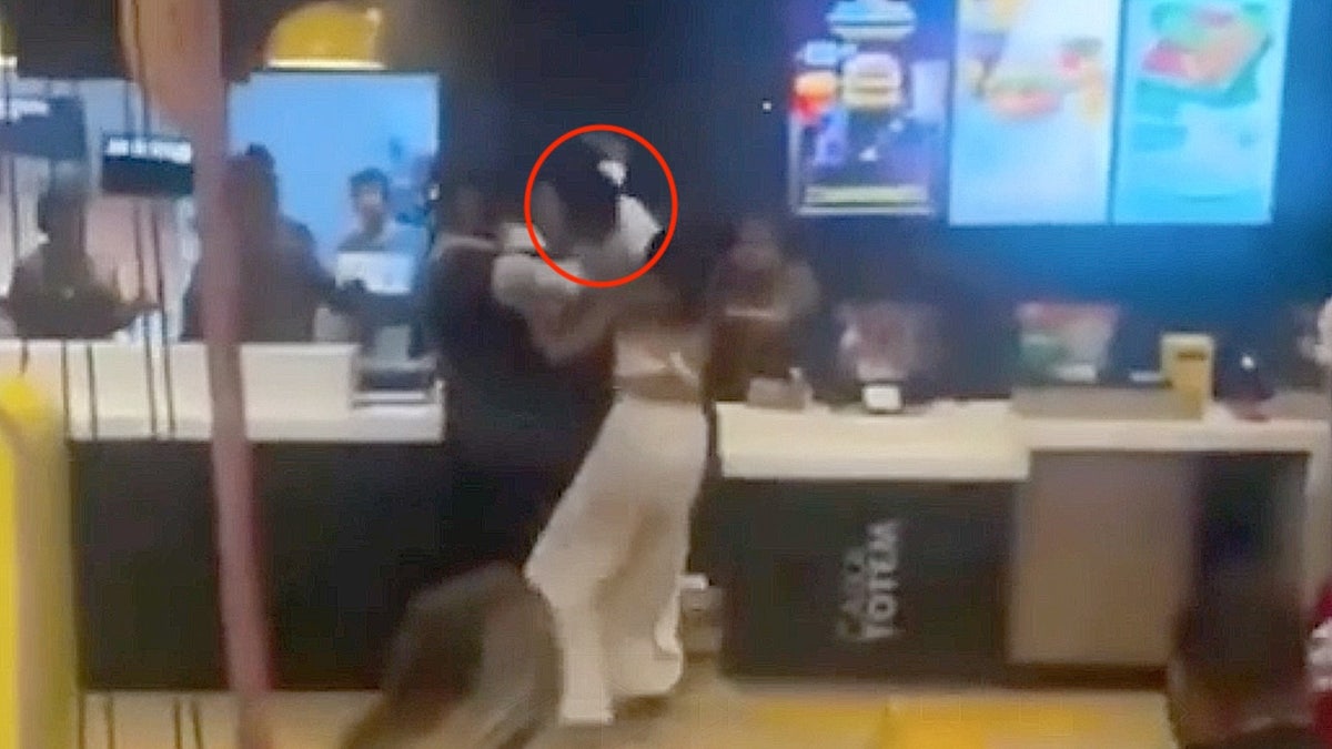 Man Flying Kick McDonald's Worker Circled In Red
