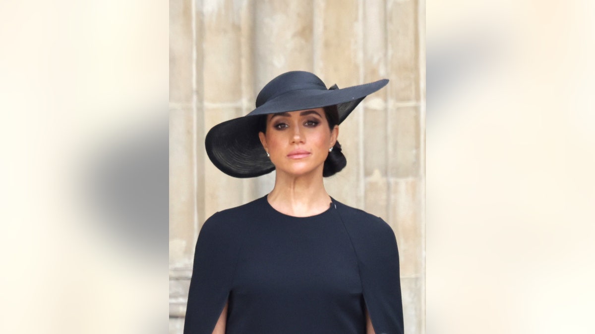 Meghan Markle dressed all in black.