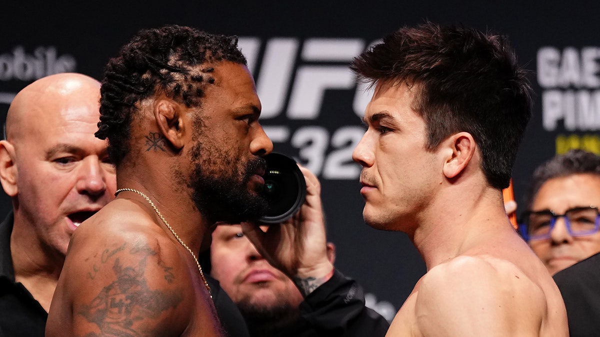 Michael Johnson and Alex Hernandez stare down