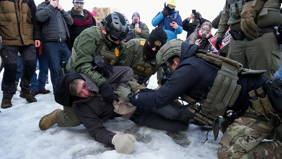 Minneapolis ICE protestor is taken down by border patrol