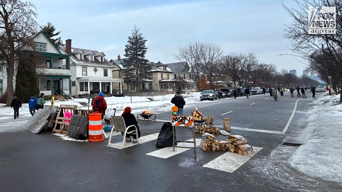 Location of ICE shooting barricaded by residents in Minneapolis
