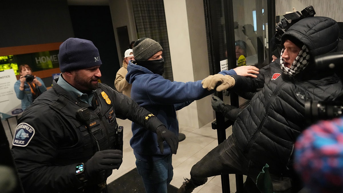 Protesters clash with cops in Minneapolis
