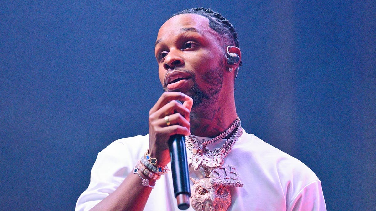 Toosii perform at a concert