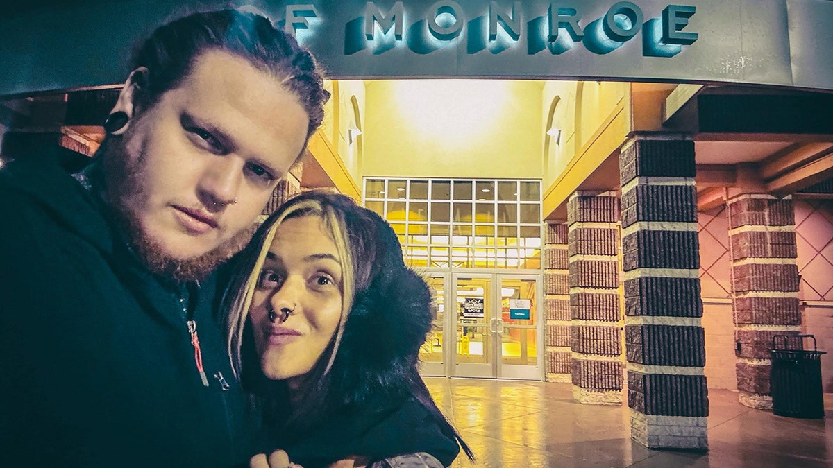 The Last Meal owner Nate Thompson and fiancee Raychel Eastes outside the Mall of Monroe in Michigan.