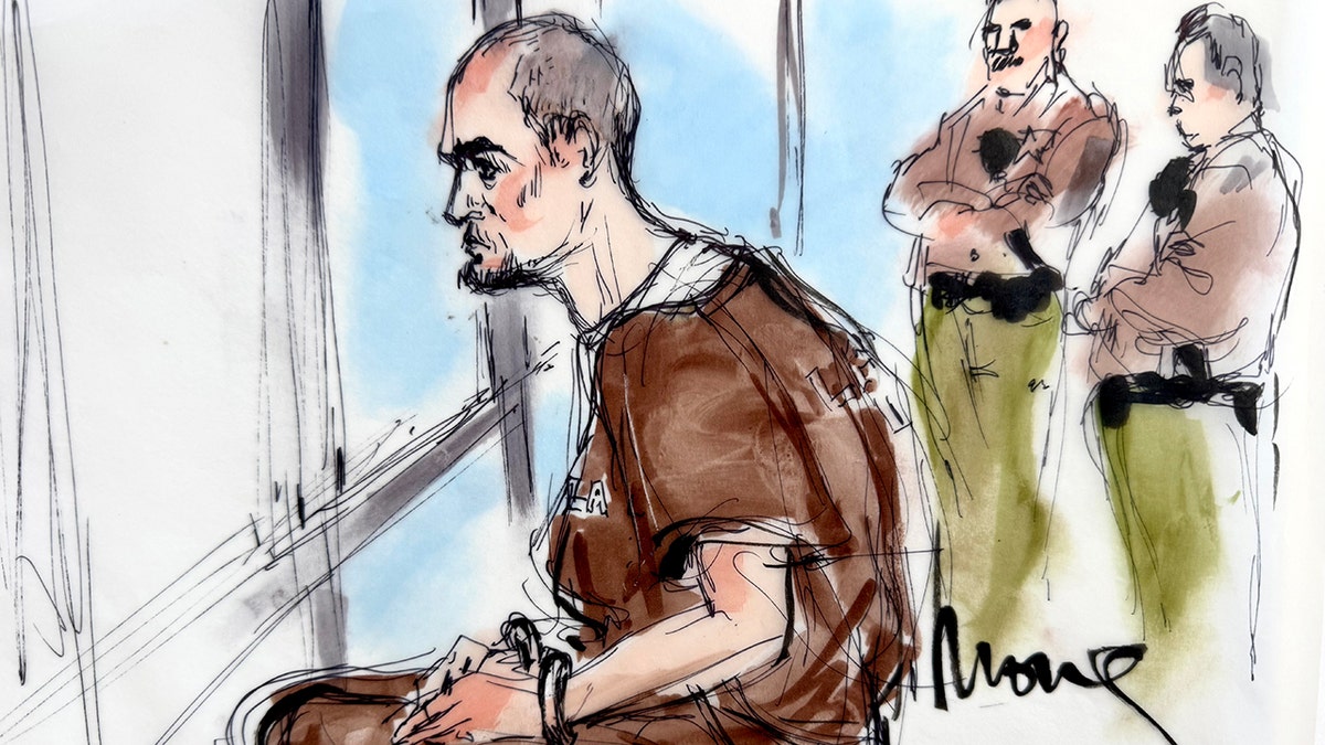 Nick Reiner sitting in the courthouse in a tan jumpsuit during his arraignment on Wednesday, Jan. 7.