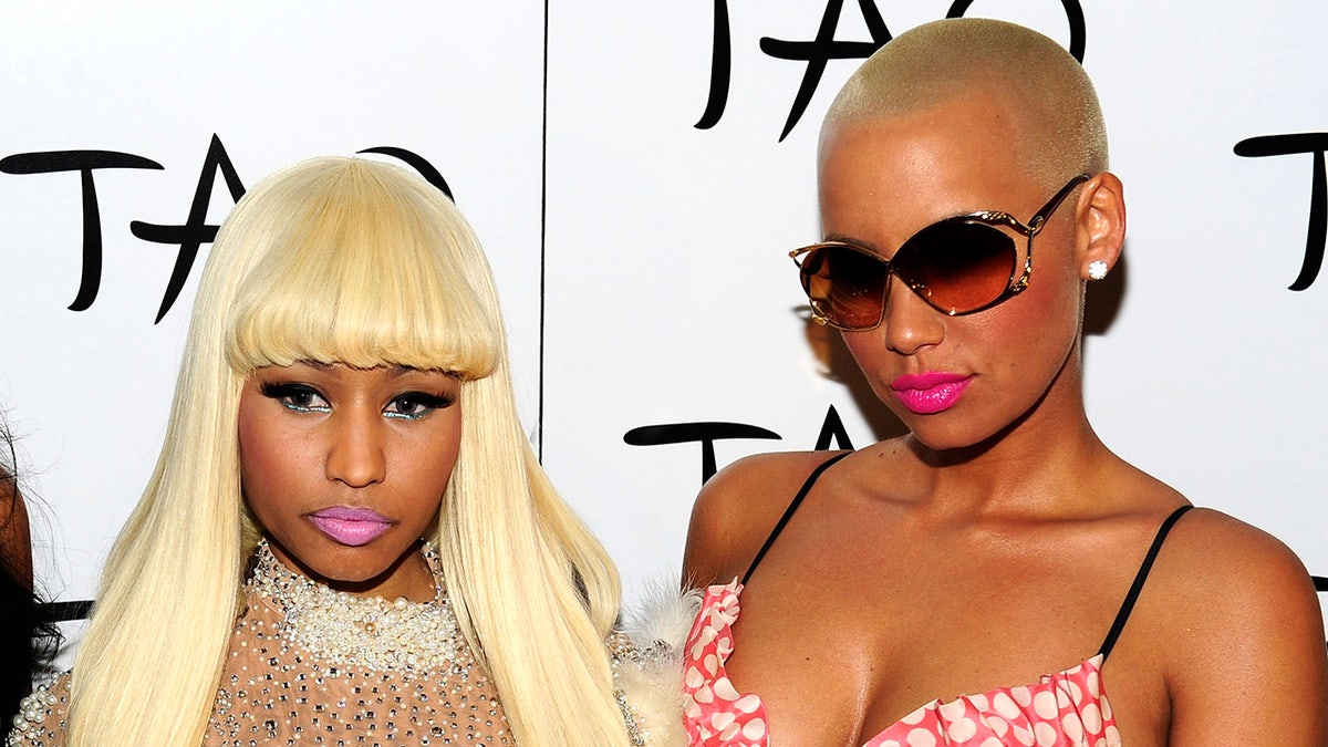 Nicki Minaj, and Amber Rose pose together while arriving at Tao Nightclub at the Venetian Resort in Las Vegas on December 9, 2010.