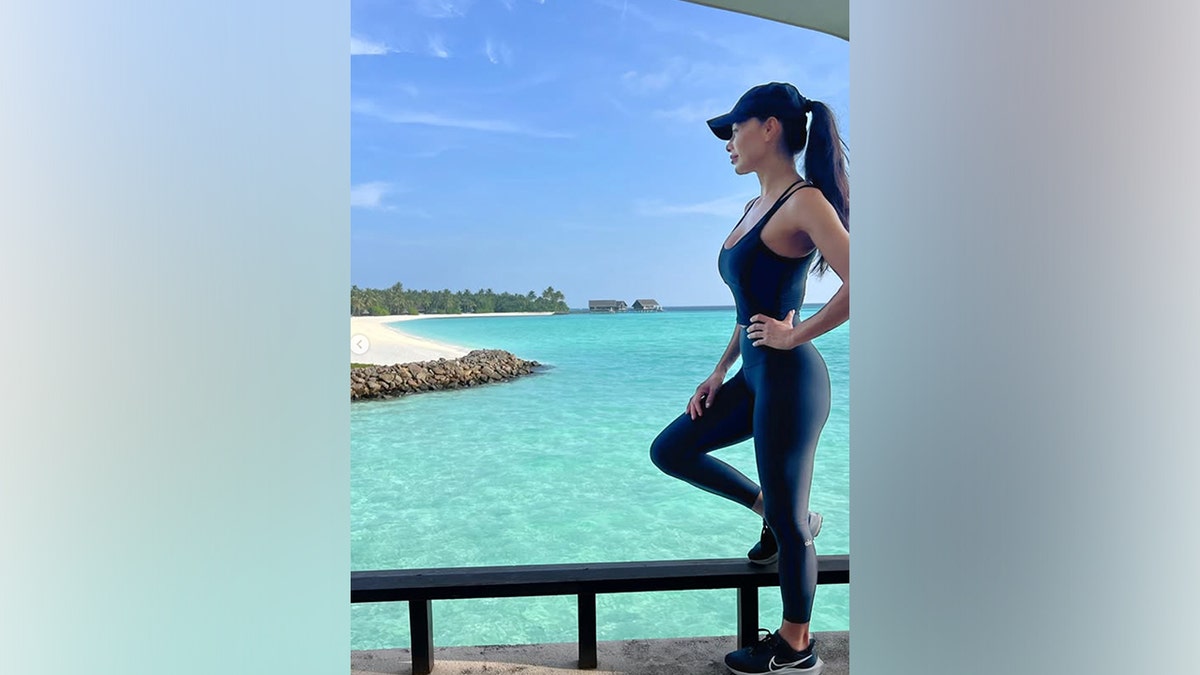 Nicole Scherzinger models an all-black athletic outfit during her Maldives vacation.