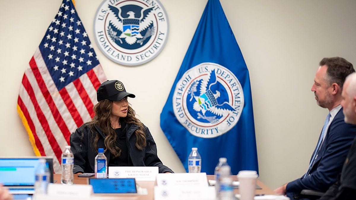 DHS Secretary Kristi Noem with officials in Minnesota.