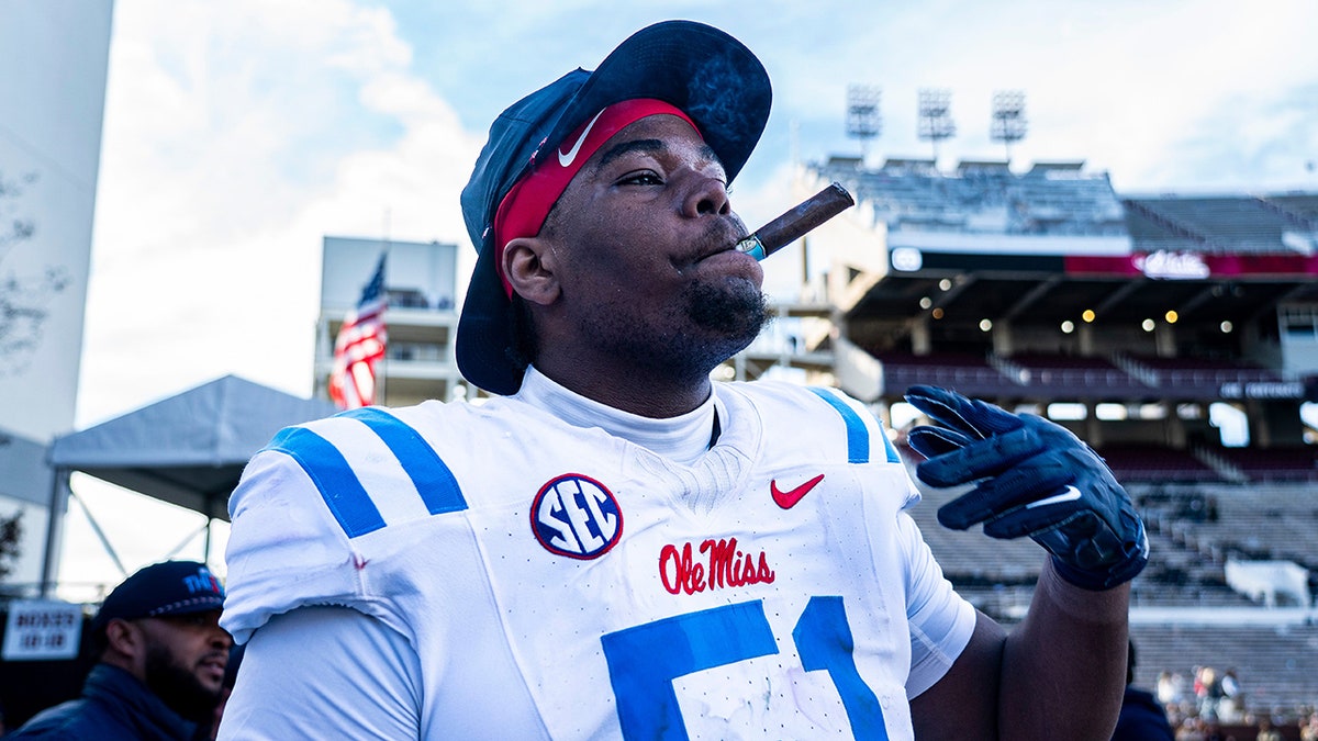 Zxavian Harris smokes cigar