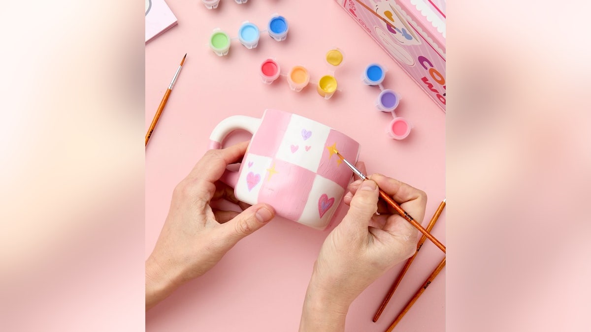 Paint and glaze ceramic mugs at home with this kit.