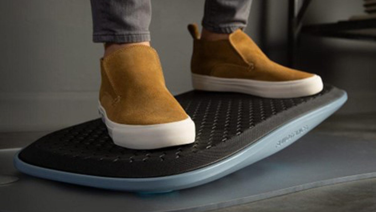 Improve your leg and core strength with a balance board.