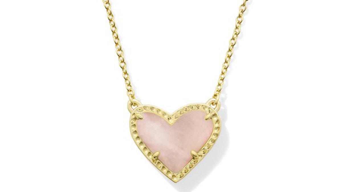 Choose from a rose quartz heart, black stone, pearl and other stones.