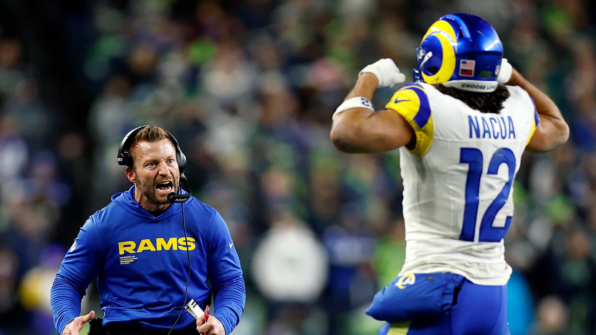 Sean McVay and Puka Nacua reacts after play